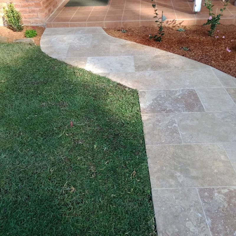 turfing and travertine paving